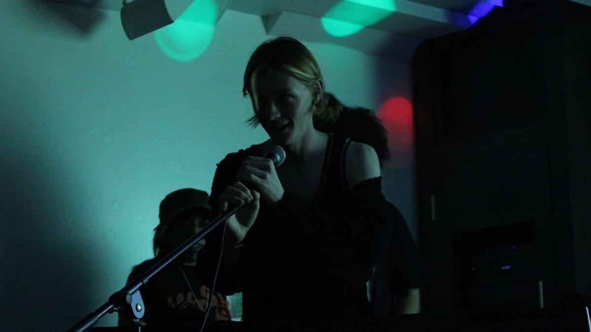 Bobby Nair addresses a concert crowd